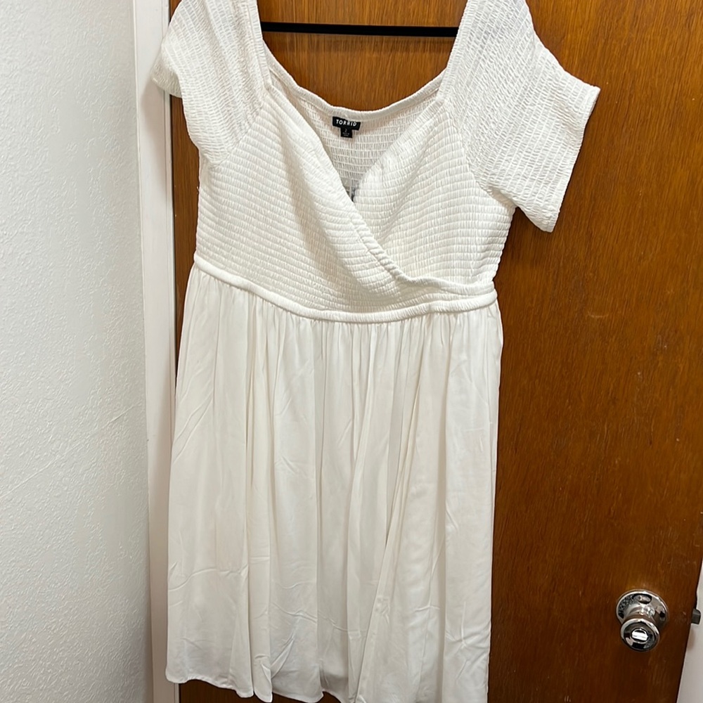 Never been worn size 2 white skater dress from torrid. Tags still on it